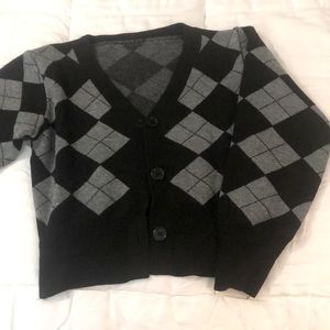 Black and grey argyle pattern buttoned sweater